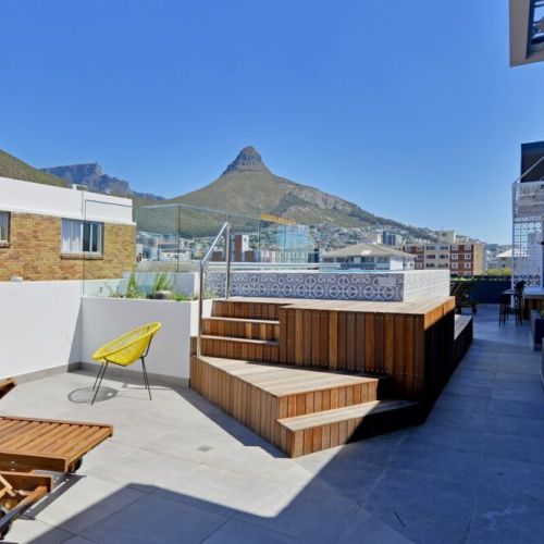 Rooftop pool with views of the Atlantic Ocean and Lions Head